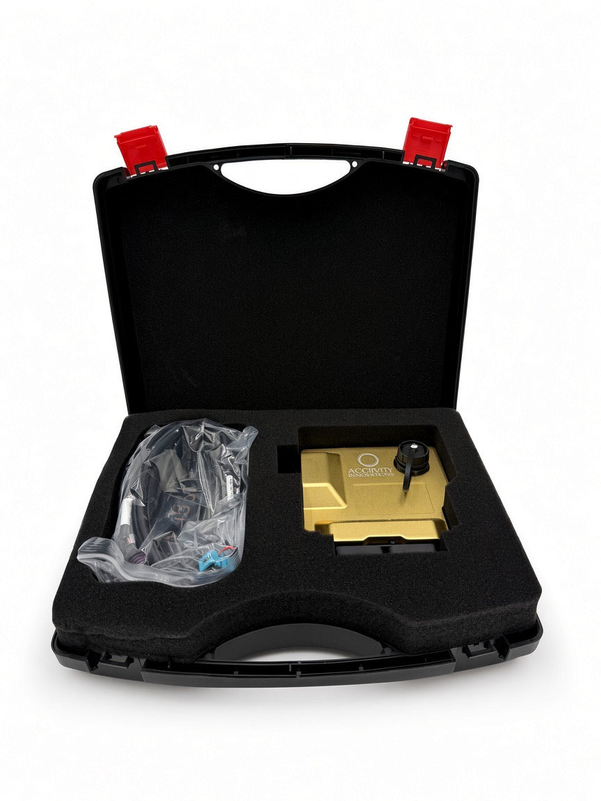 Gold Acclivity Pro R ECU and harness pictured in a protective carry case