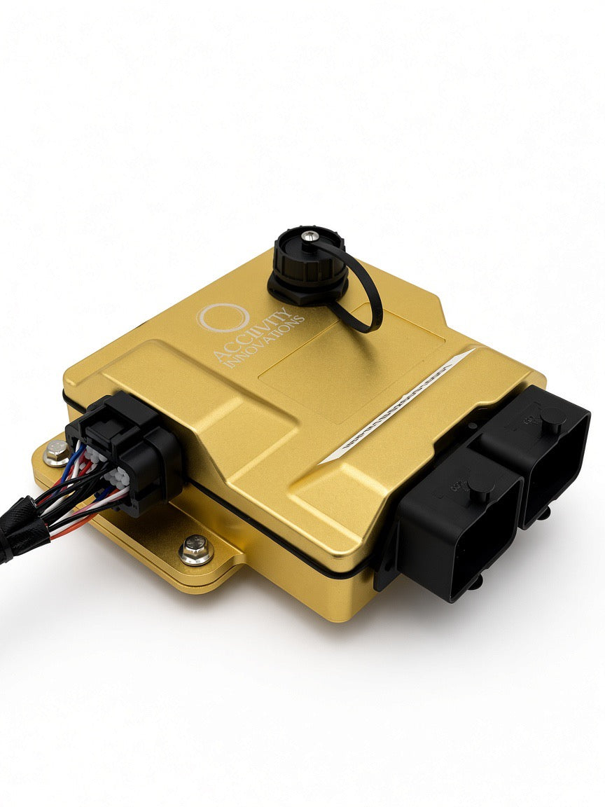 Gold Acclivity Axiom Pro R ECU with expansion harness connected, angled detail