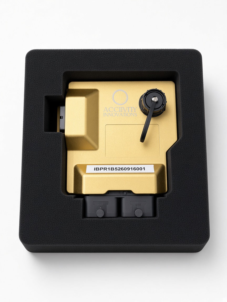 Gold Acclivity Axiom Pro R ECU seated in protective foam