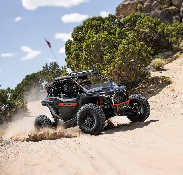 Polaris RZR Pro S Ultimate two-seat with accessory Desert Package, complete vehicle on a dirt trail