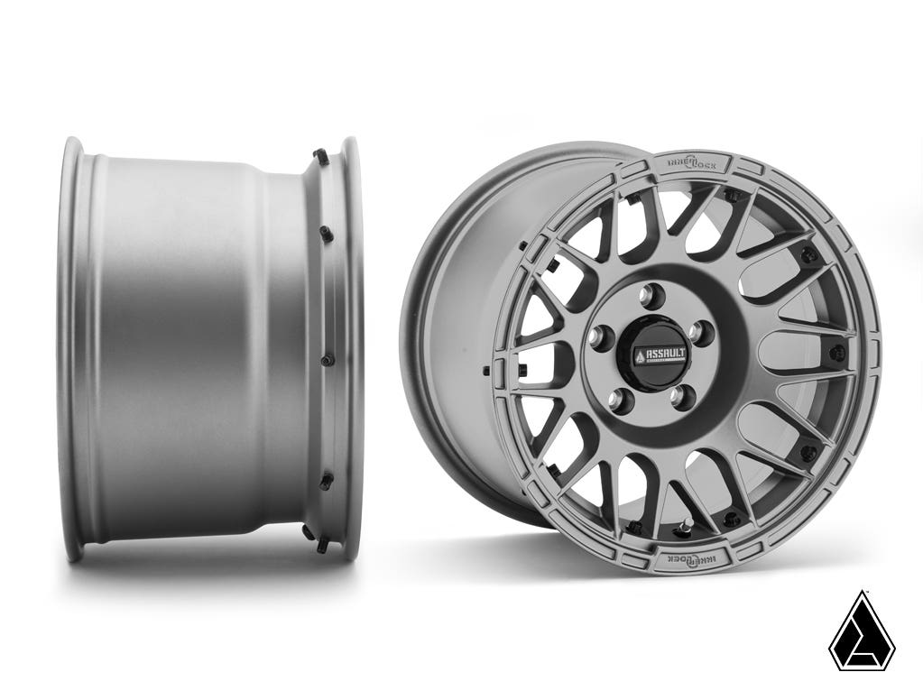 Standard XT Warrior Tires 35x10x15 on 15x10 Assault Industries Hellfire Matte Titanium 4/136 Pattern for Maverick X3 and Commander