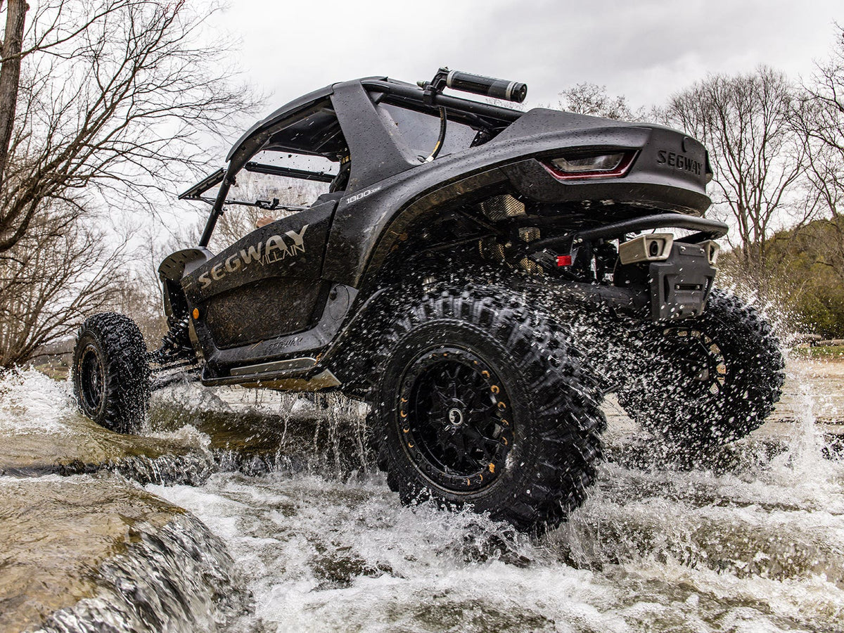 Standard XT Warrior Tires 32x10x15 on 15x7 Assault Industries Hellfire Matte Titanium Wheels 4/136 Pattern for Maverick X3 and Commander