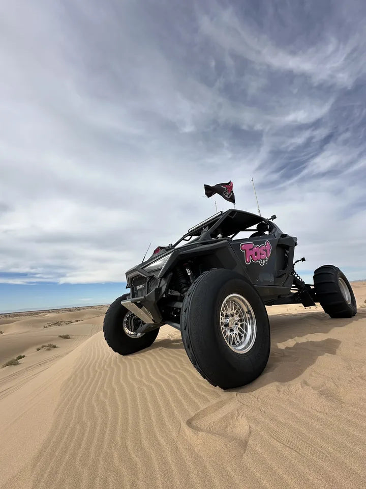 Low-angle view of a FastUTV dune build on the sand